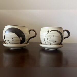 Kissing Cups with Saucers